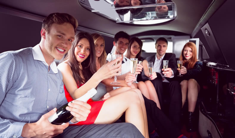 Passengers enjoy party inside limousine